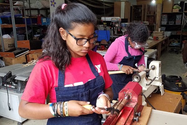 Woodworking classes for girls in an orphanage